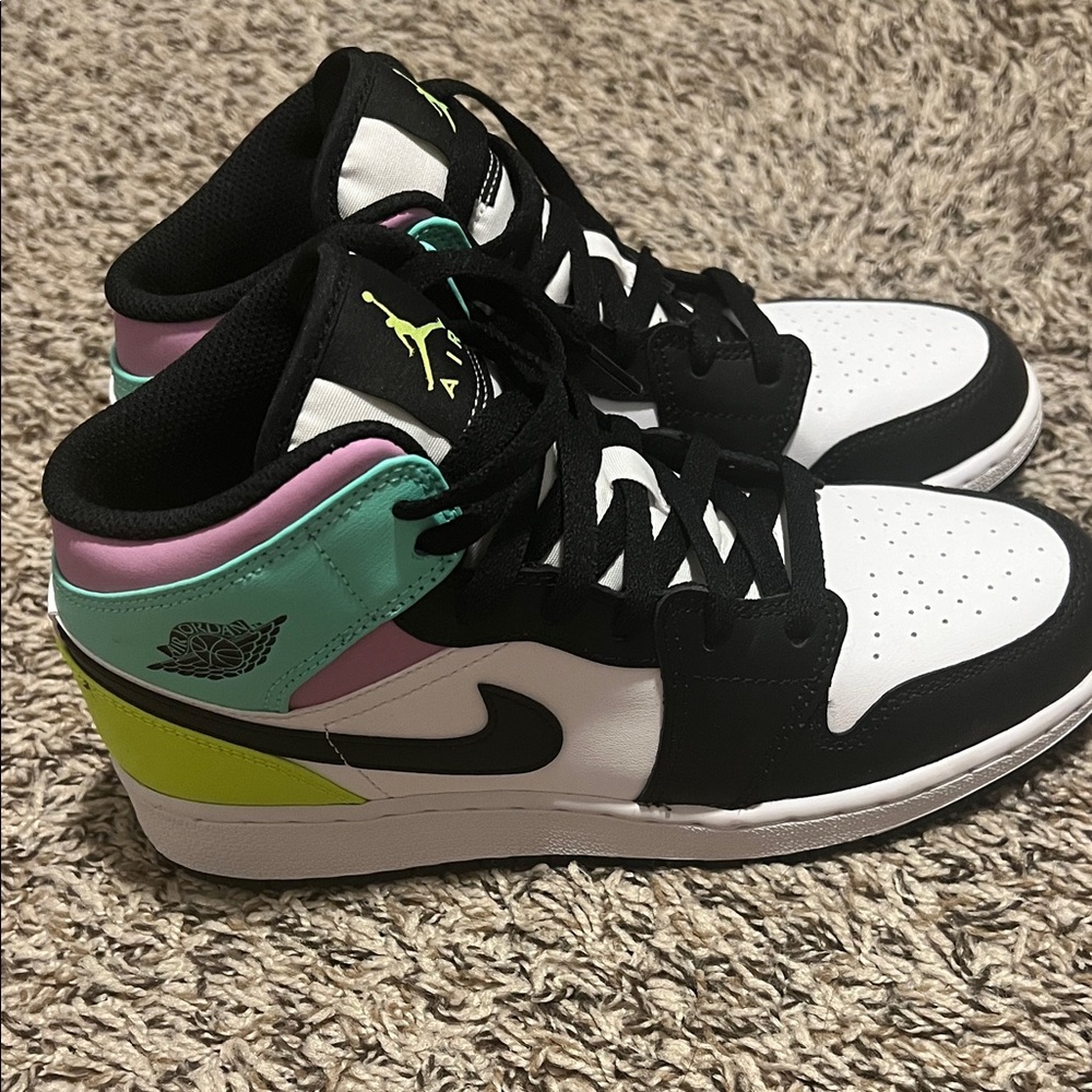 Nike kid and White Sneakers with Pink and Green Accents